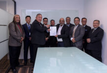 TRANSONIC JET PROPELS AIRLINE INDUSTRY WITH RM50 MILLION MERGER DEAL Ahmad Sufiani (third left) exchange document with Mohamed Yunus after the signing of MoU in Kuala Lumpur today.